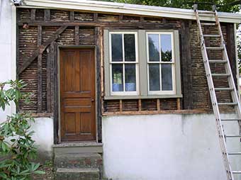 Exposed plaster & lathe