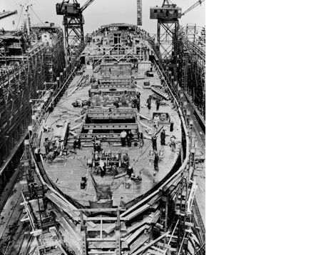 Complete the upper deck and mast houses.