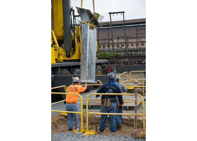 Lowering the base into place.
